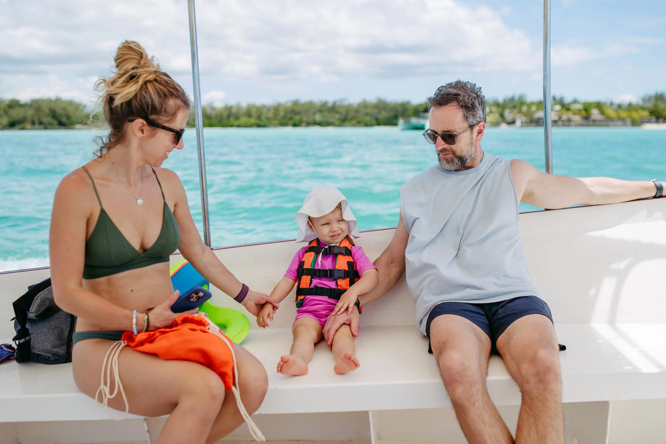 Parent supervising young child during a Watamu boat excursion